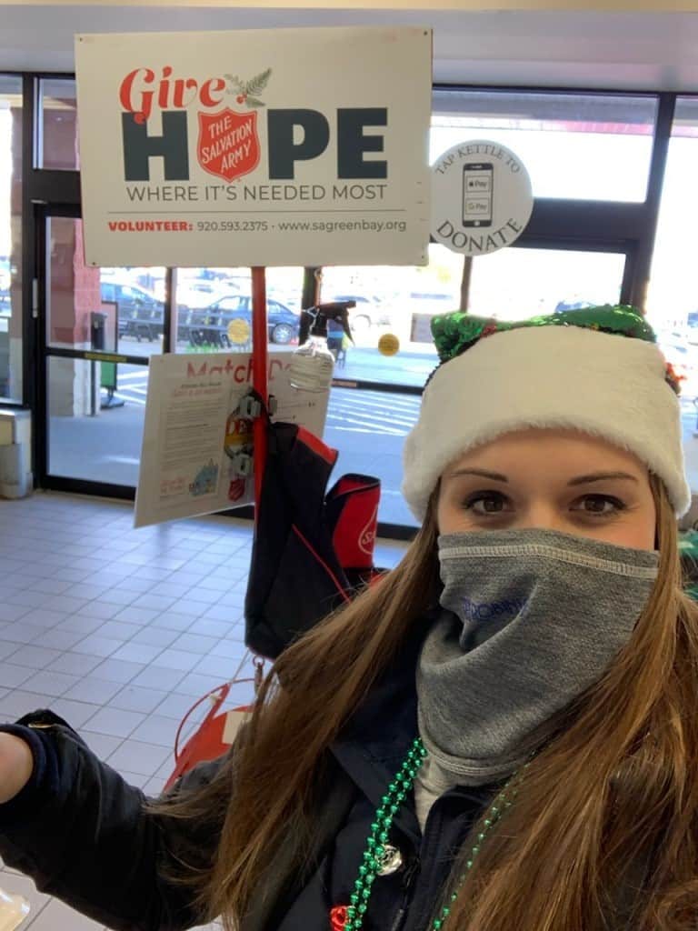 Cassie bell ringing for The Salvation Army