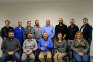 Robinson Inc. Group Photo of Rolls Royce Award